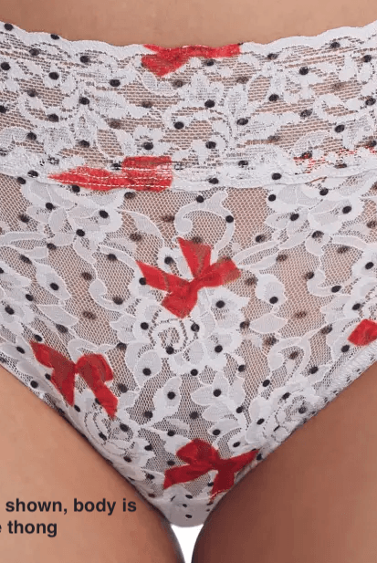 Hanky Panky Low Rise Thong – Signature Lace with red bows, One Size Fits Most, model wearing low rise thong.