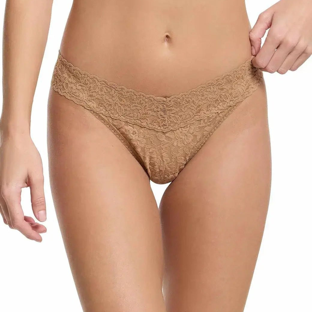 Hanky Panky Original Rise Thong in nude color featuring signature lace design for comfort and style.