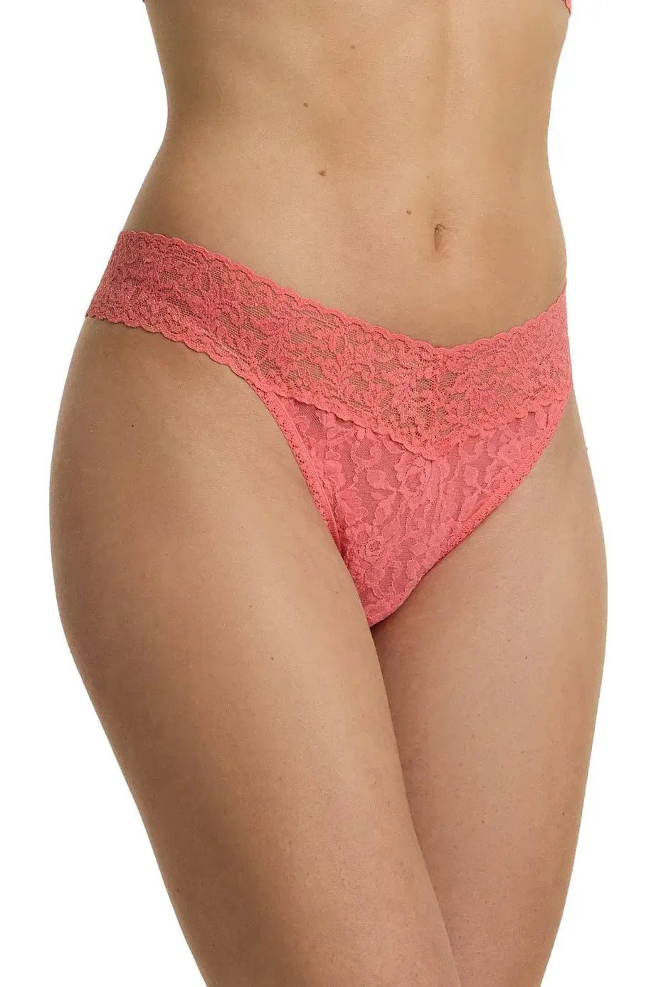 Hanky Panky Original Rise Thong in coral pink lace, showcasing its signature design and comfortable fit.