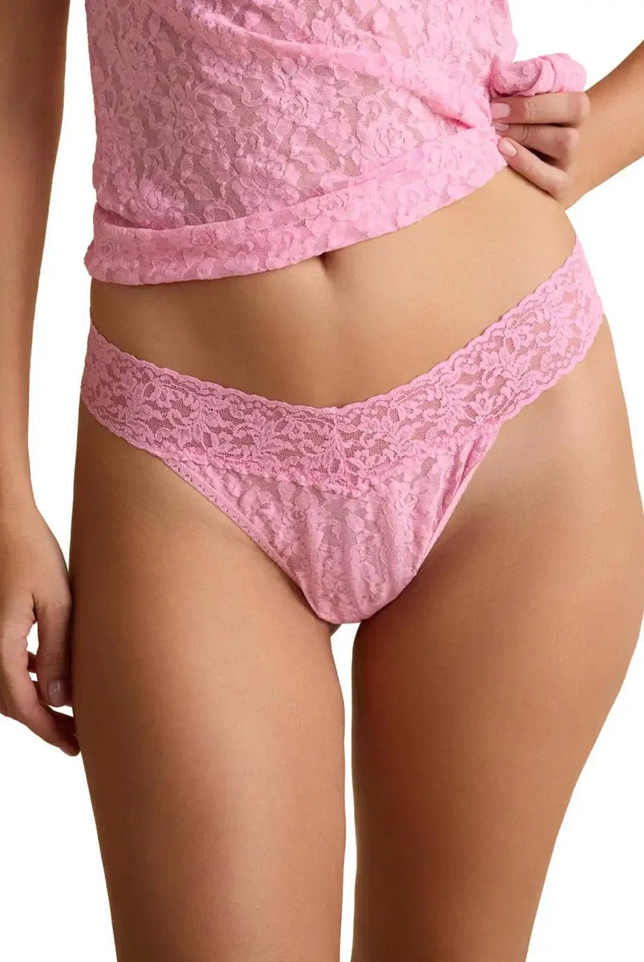 Hanky Panky Original Rise Thong - Signature Lace in pink on model showcasing a stylish and comfortable fit.