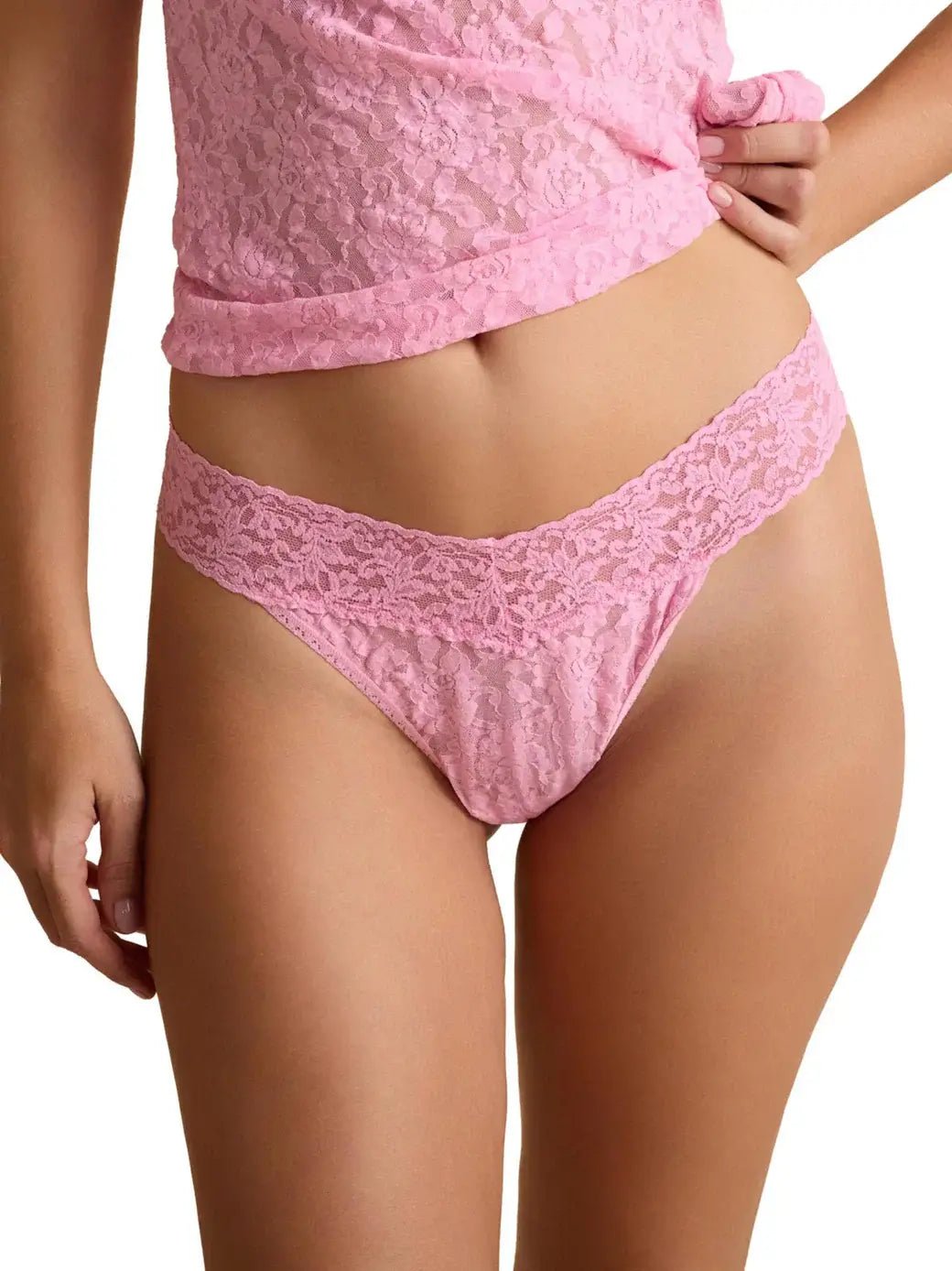 Hanky Panky Original Rise Thong - Signature Lace in pink on model showcasing a stylish and comfortable fit.