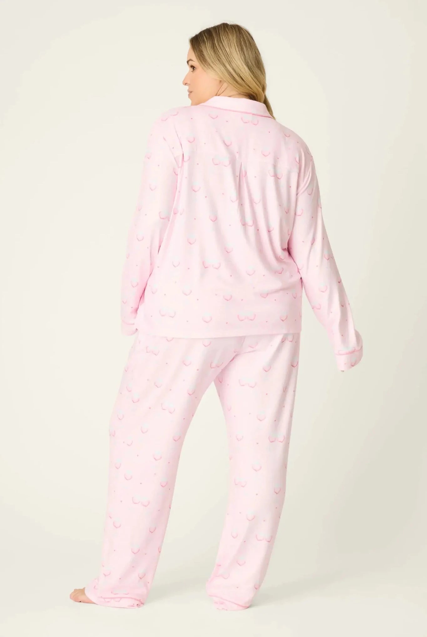 Happy Hour Wine Glass Print 3-Piece PJ Set Plus Size Inclusive model wearing playful pink pajama set with wine glass pattern, back view.
