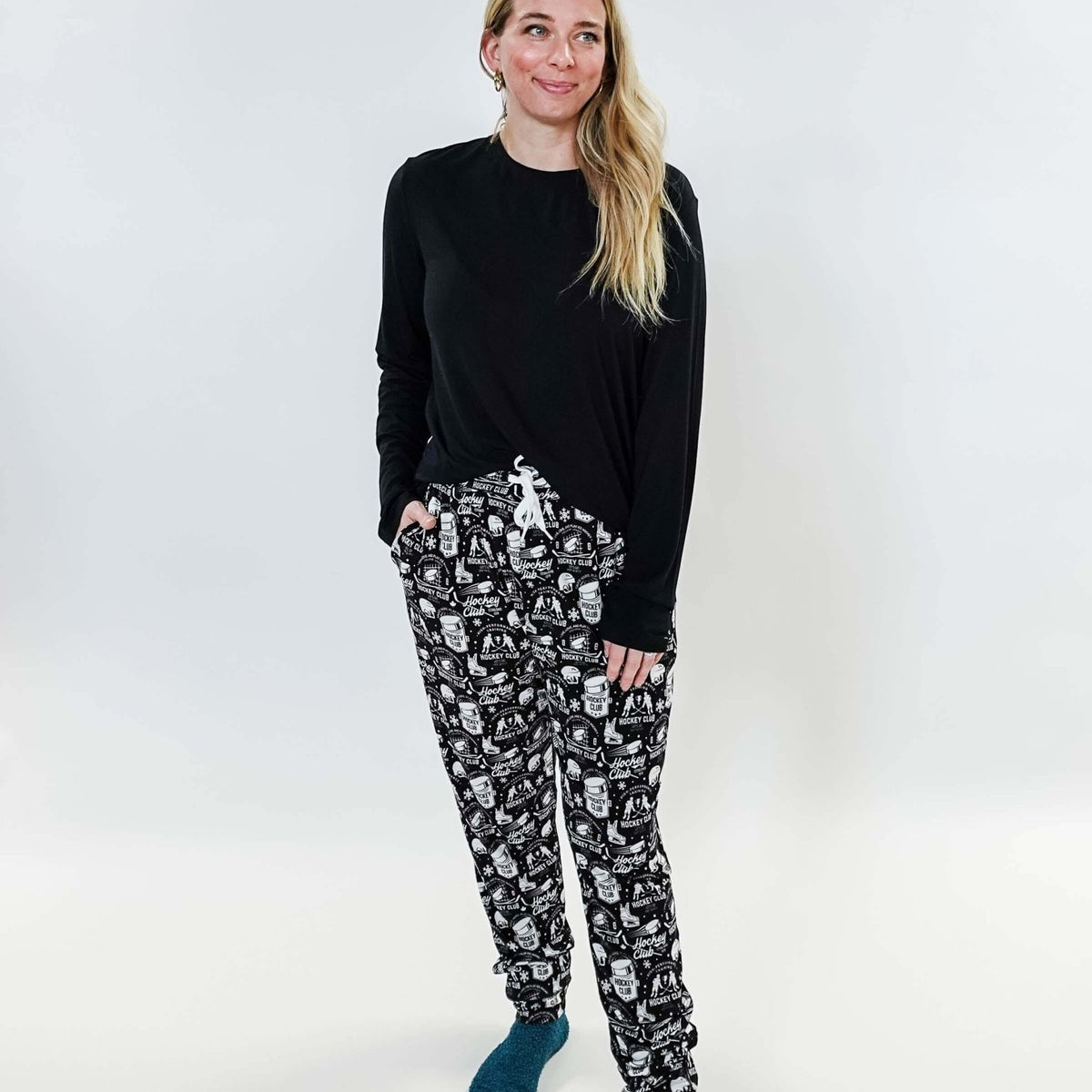 He Scores Hockey Print Unisex Bamboo Jogger worn by a model, showcasing a comfortable and stylish design.