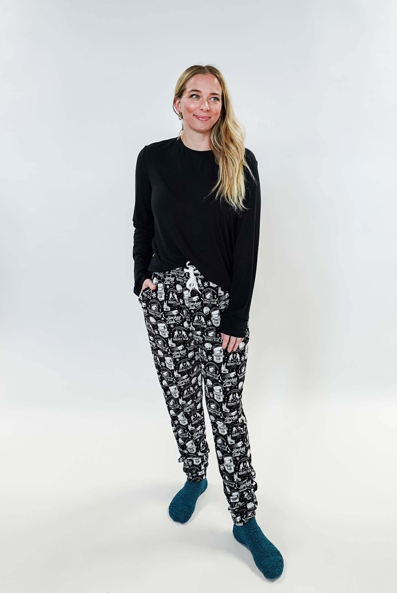 He Scores Hockey Print Unisex Bamboo Jogger worn by a model, showcasing a comfortable and stylish design.