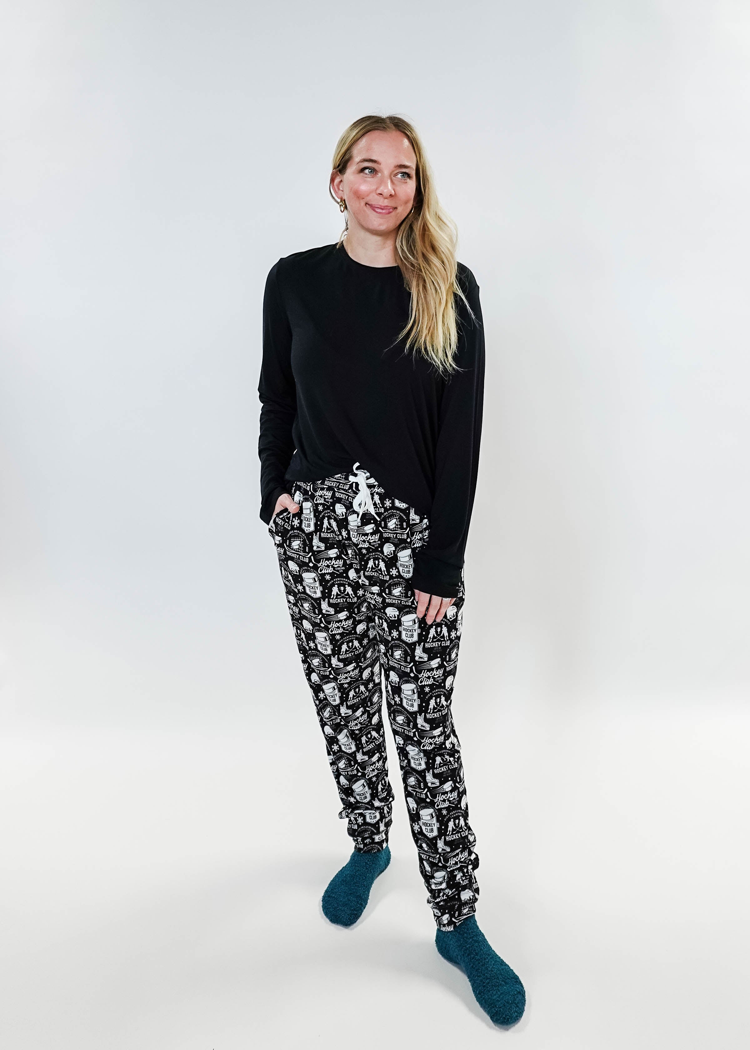 He Scores Hockey Print Unisex Bamboo Jogger worn by a model, showcasing a comfortable and stylish design.