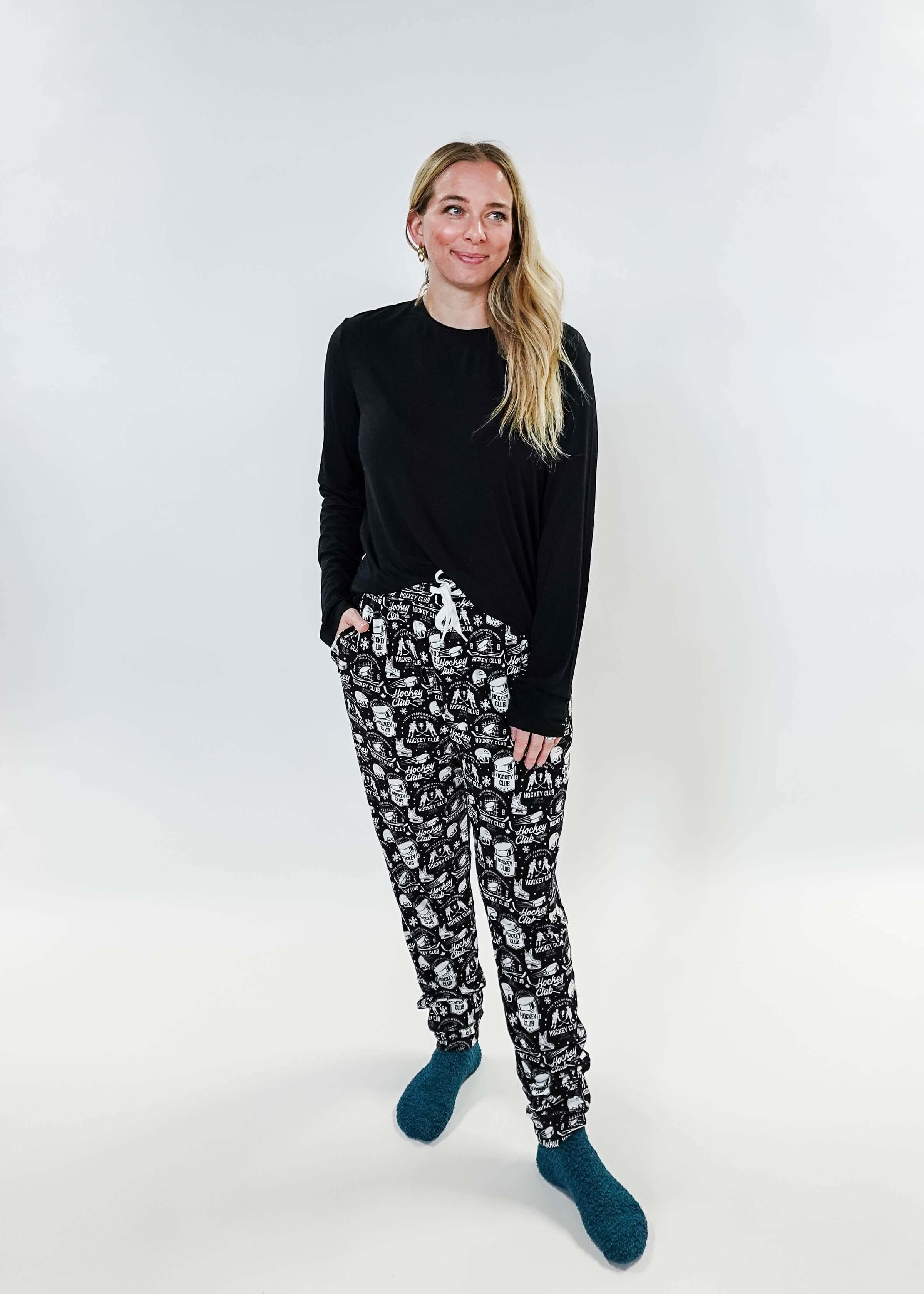 He Scores Hockey Print Unisex Bamboo Jogger worn by a model, showcasing a comfortable and stylish design.