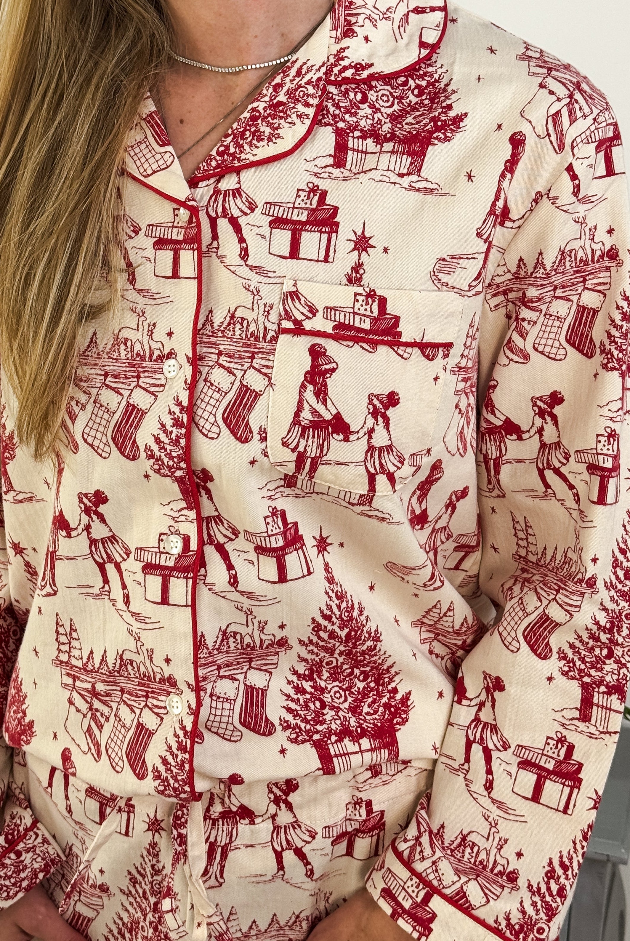 Model wearing the Holiday Memories Flannel Button-Up PJ Set featuring festive holiday patterns.