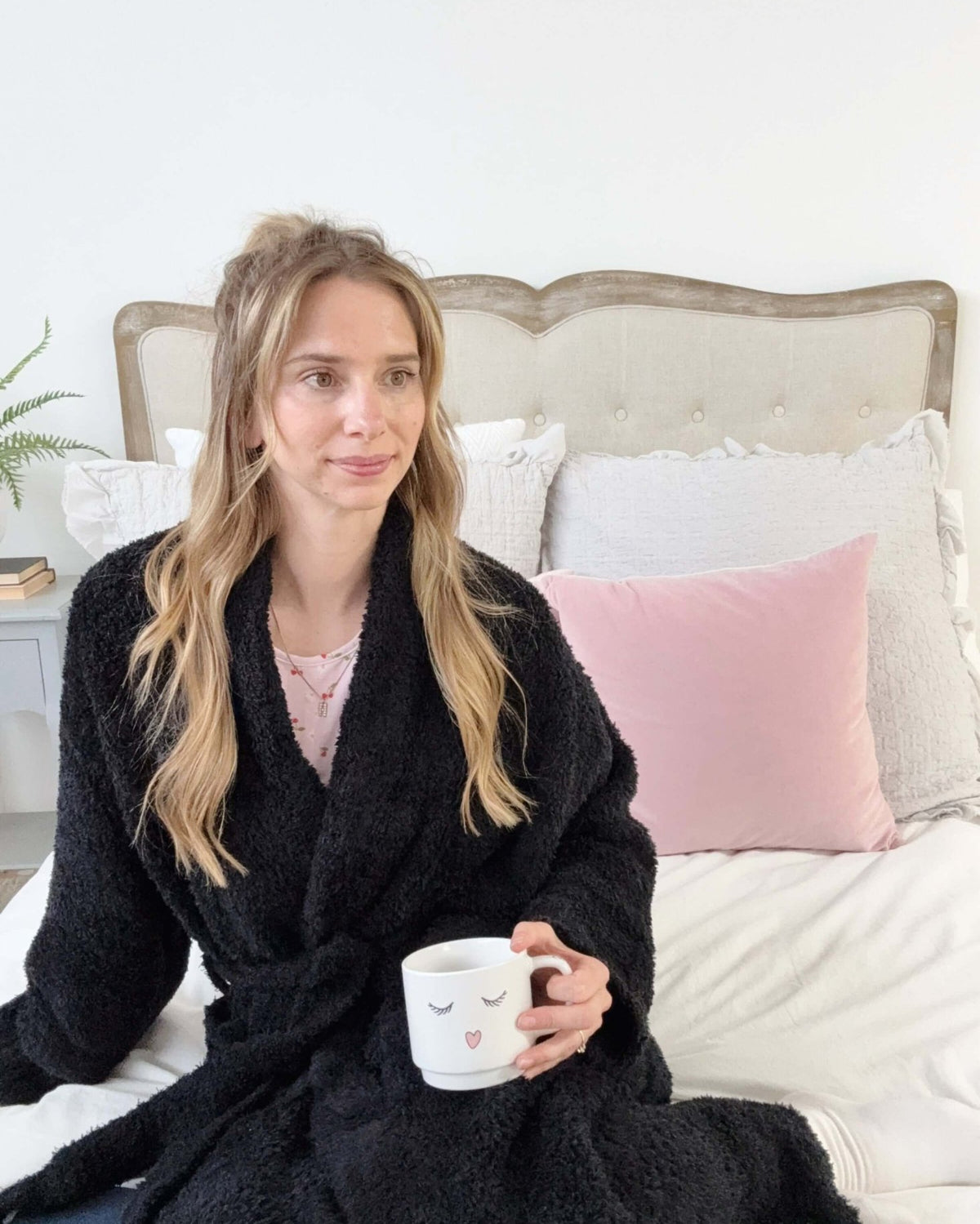 Lounge by Jan Marie Chenille Cloud Spa Robe Jet Black model on bed with mug lifestyle — Cloud Nine Pajamas Edmonton