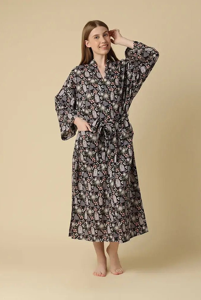 Kitty Cat Cotton Long Robe Mahogany on model, featuring playful grey cats among blooming flowers.