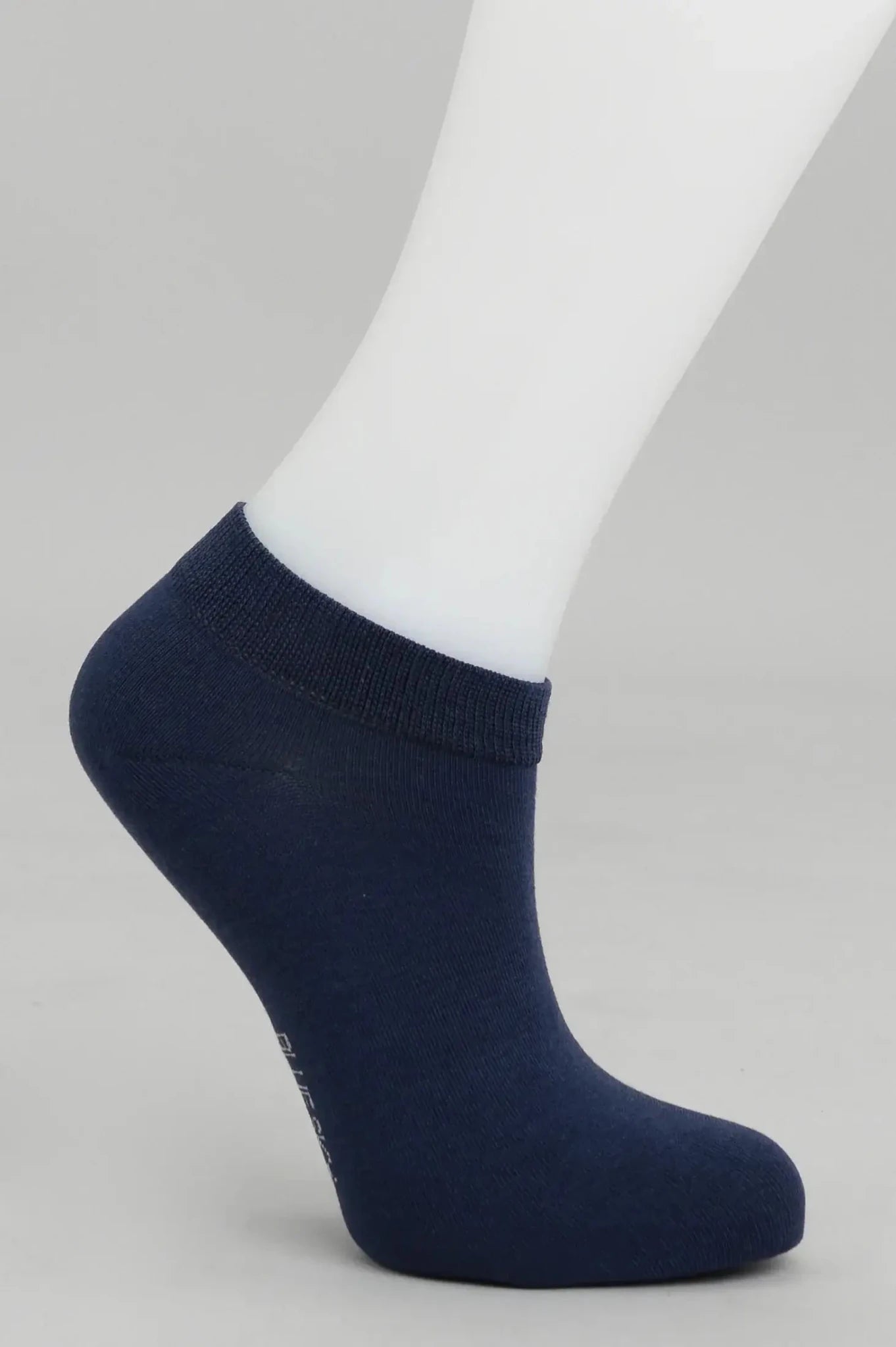 Ladies Bamboo Ankle Socks displayed on a mannequin foot, showcasing soft and moisture-wicking trainer design.