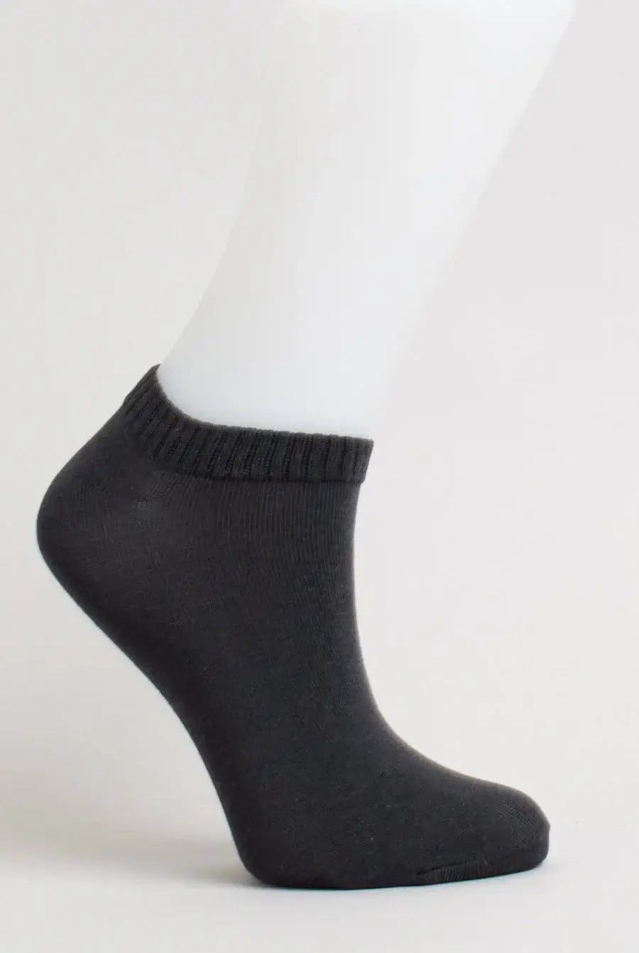 Ladies Bamboo Ankle Socks in dark gray displayed on a mannequin foot, showcasing a soft and comfortable design.