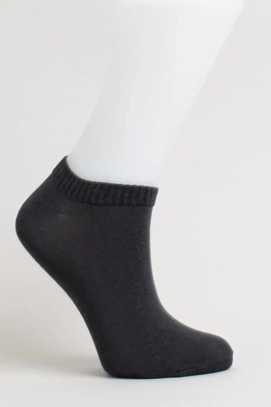 Ladies Bamboo Ankle Socks in dark gray displayed on a mannequin foot, showcasing a soft and comfortable design.