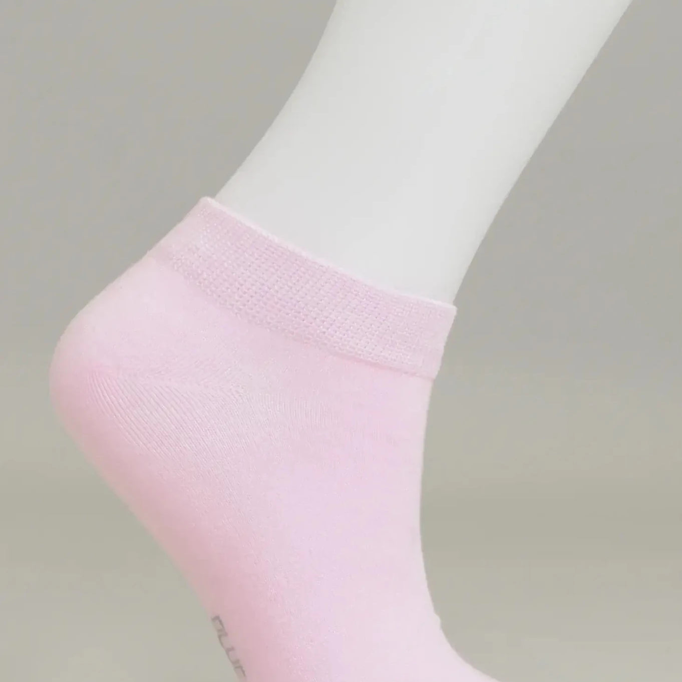 Ladies Bamboo Ankle Socks in soft pink, showcasing a comfortable fit for active lifestyles.