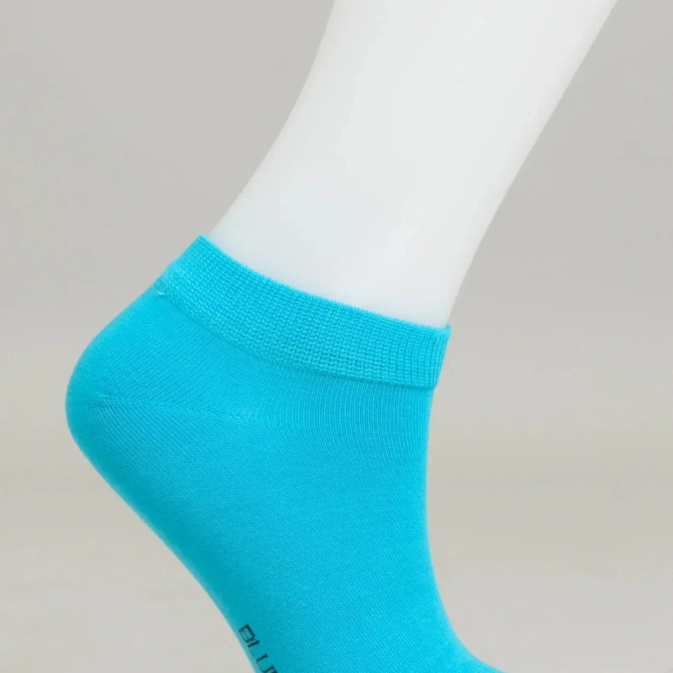 Ladies Bamboo Ankle Socks in vibrant turquoise for comfort and moisture-wicking performance.