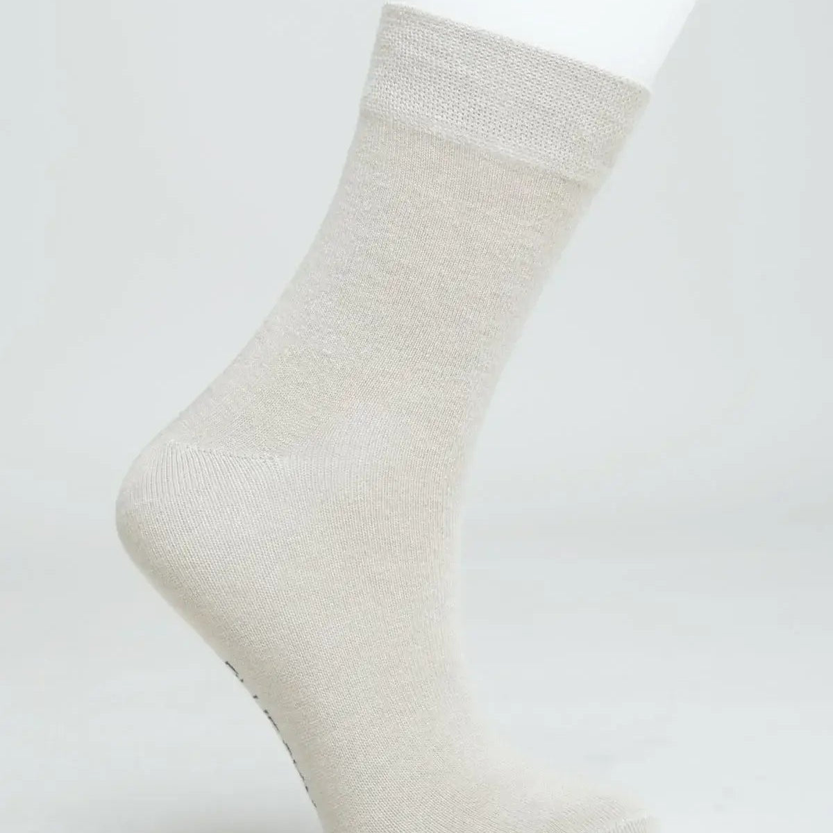 Ladies Bamboo Crew Dress Socks in beige color showcasing moisture-wicking and antibacterial features.