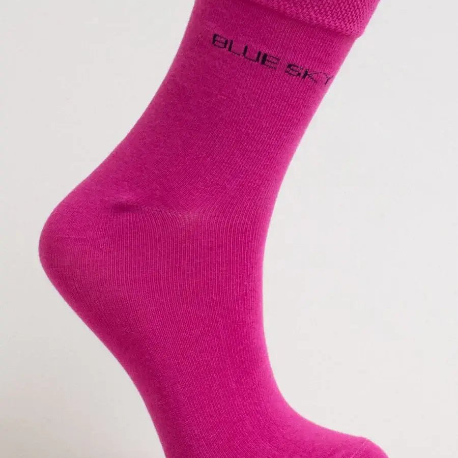 Ladies Bamboo Crew Dress Socks in vibrant pink by Blue Sky Clothing Co, featuring a soft and comfortable design.