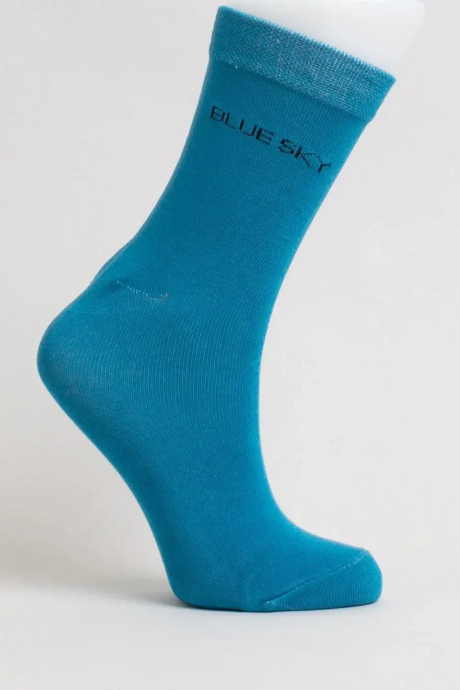 Ladies Bamboo Crew Dress Socks in teal by Blue Sky Clothing Co, showcasing a smooth design and comfortable fit.