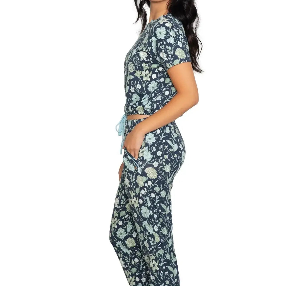 Latte Love Floral Print Cotton-Modal Relaxed Set Drop Shoulder Tee & Jogger Set modeled by a woman in profile.