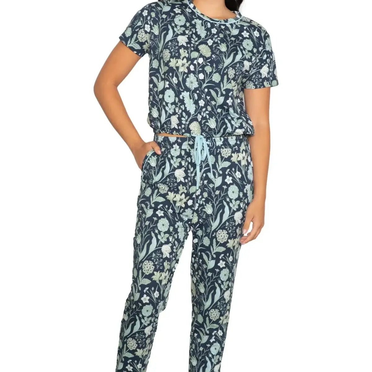 Latte Love Floral Print Cotton-Modal Relaxed Set Drop Shoulder Tee & Jogger Set worn by a model, showcasing floral design.