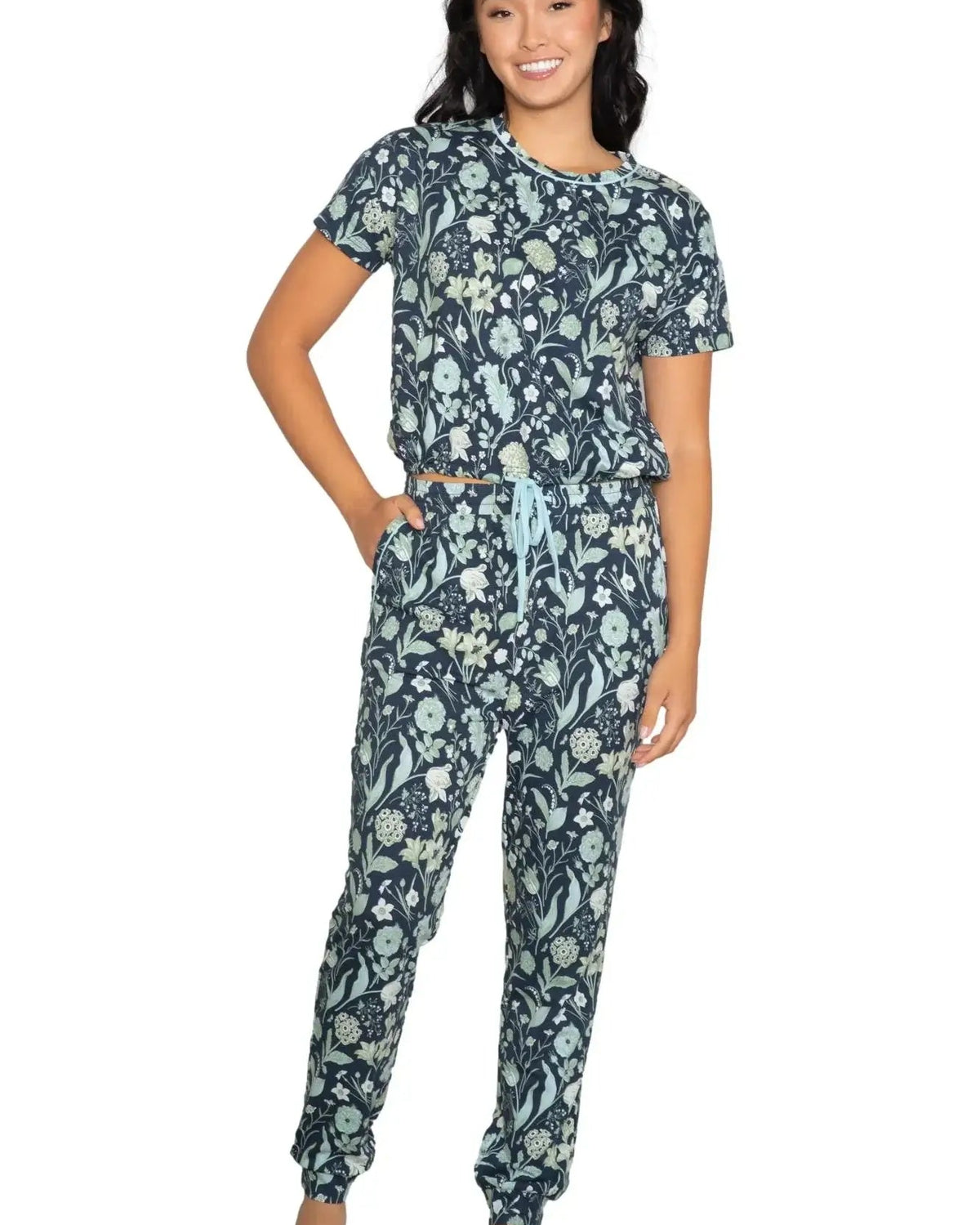 Latte Love Floral Print Cotton-Modal Relaxed Set Drop Shoulder Tee & Jogger Set worn by a model, showcasing floral design.