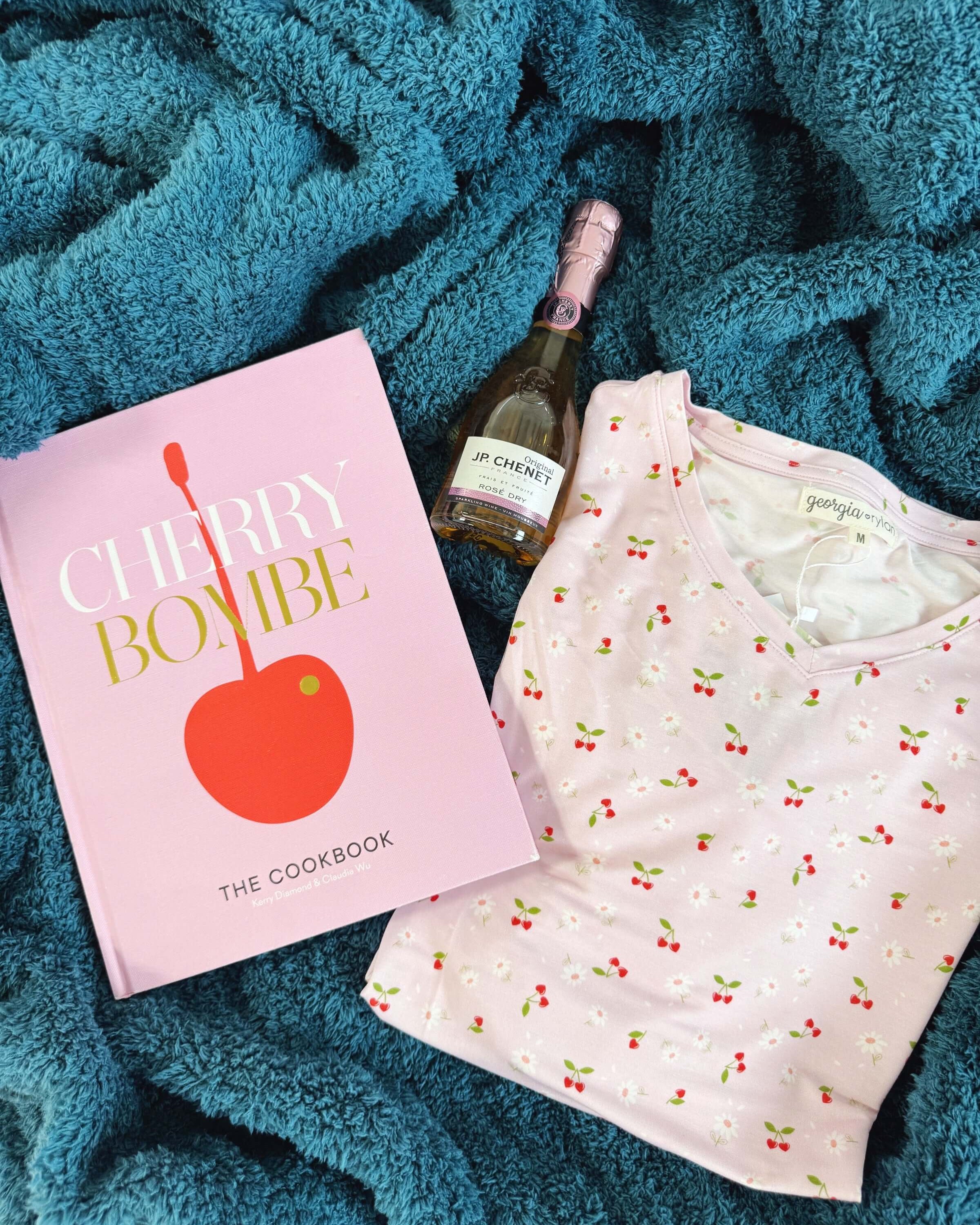 Cozy Cabin Blanket in Peacock Blue on bed