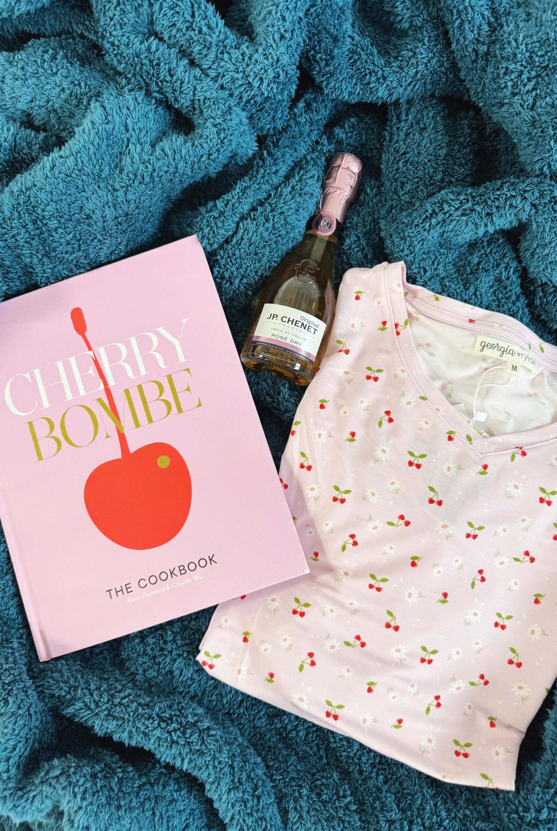 Cozy Cabin Blanket in Peacock Blue on bed