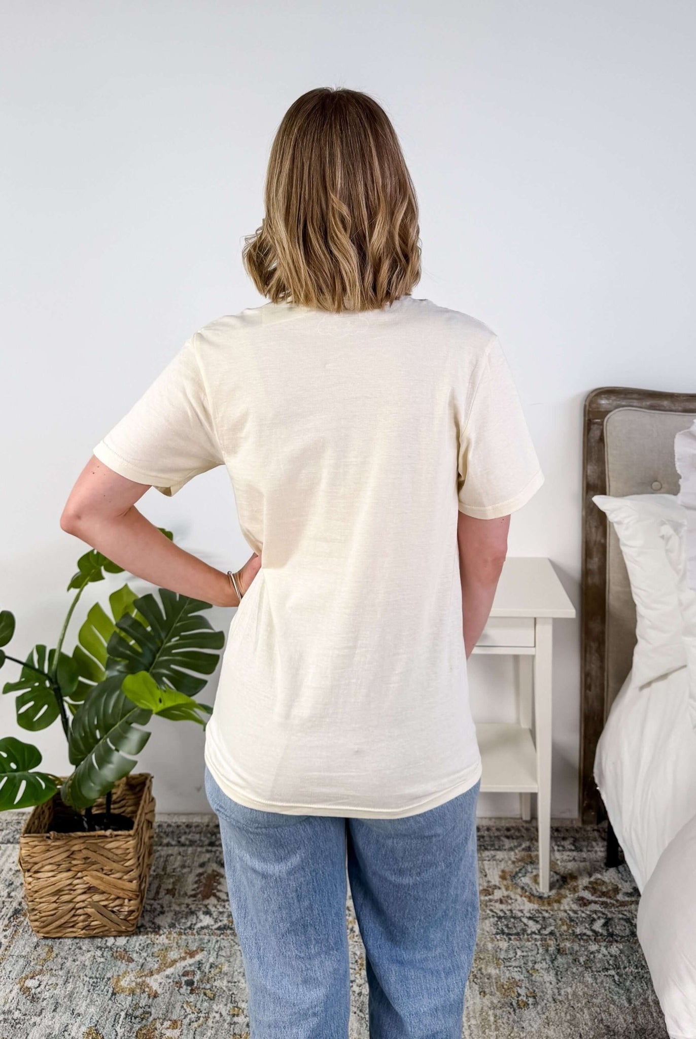 Cream Crew Fit Graphic Tee side profile on model back profile