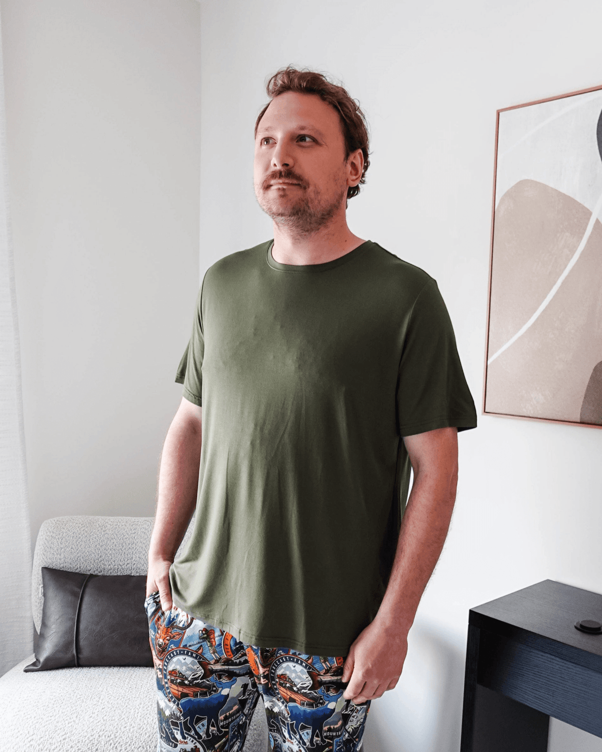 Bob's Sleepwear Co. Bamboo Sleep Tee Olive Green on model with patterned pants lifestyle — Cloud Nine Pajamas Edmonton