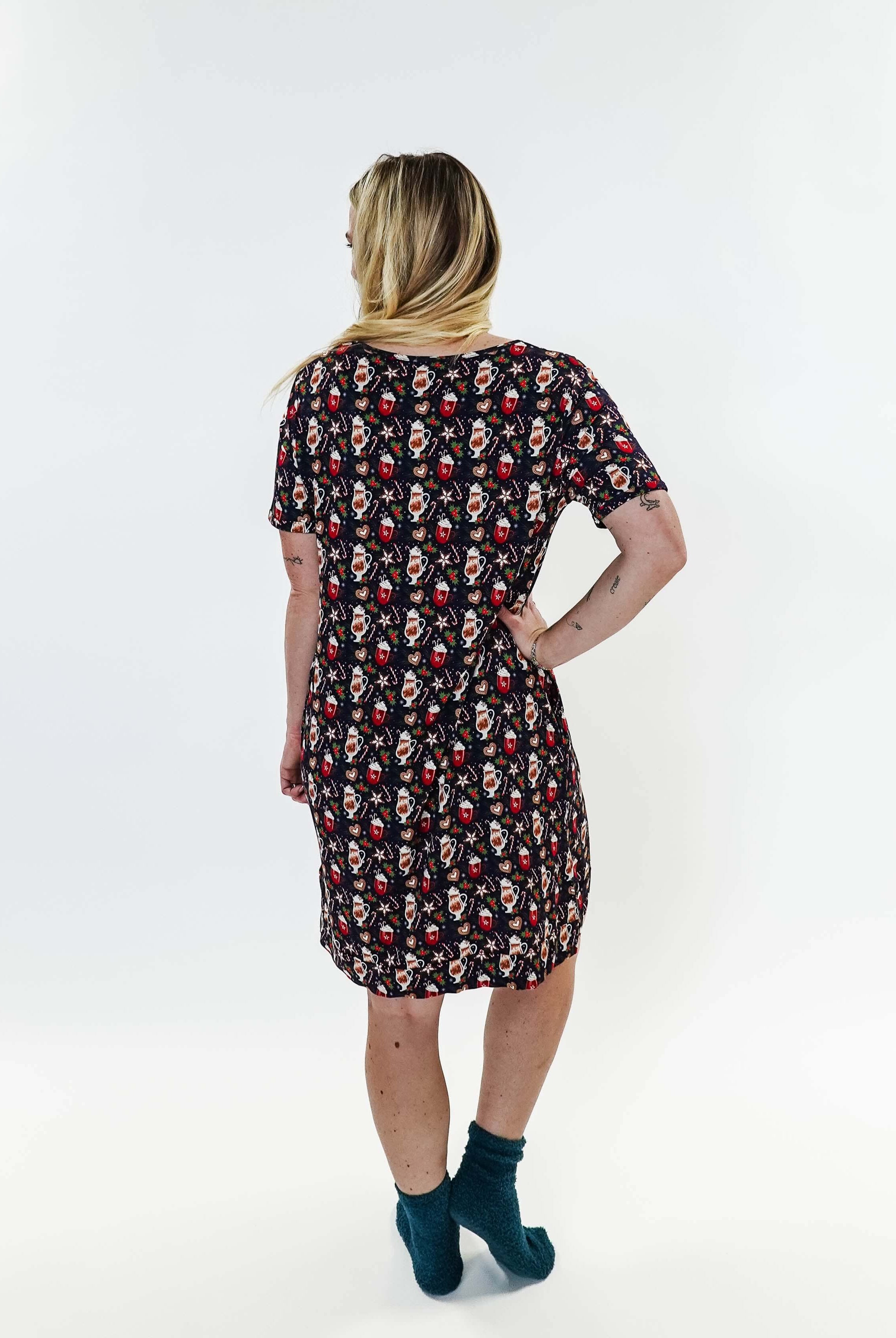 Merry Mugs V-Neck Bamboo Nightshirt featuring a whimsical holiday print, modeled by a woman standing with a cheerful expression.