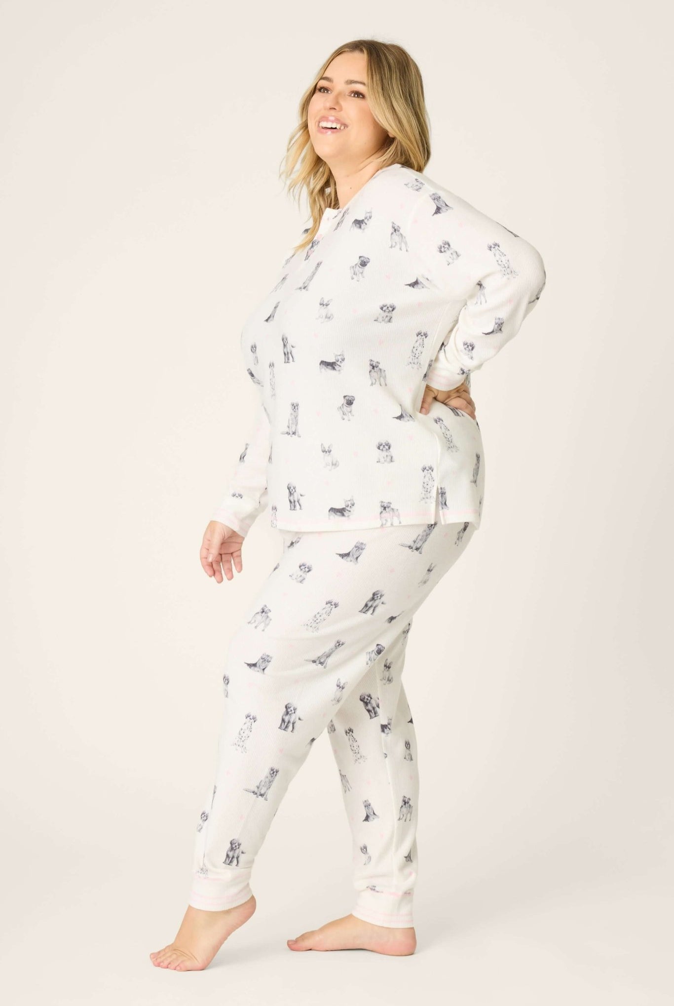 My Dog is my Valentine Peachy Jersey Jogger Set PJ Salvage model wearing comfy loungewear with dog print in a stylish pose.