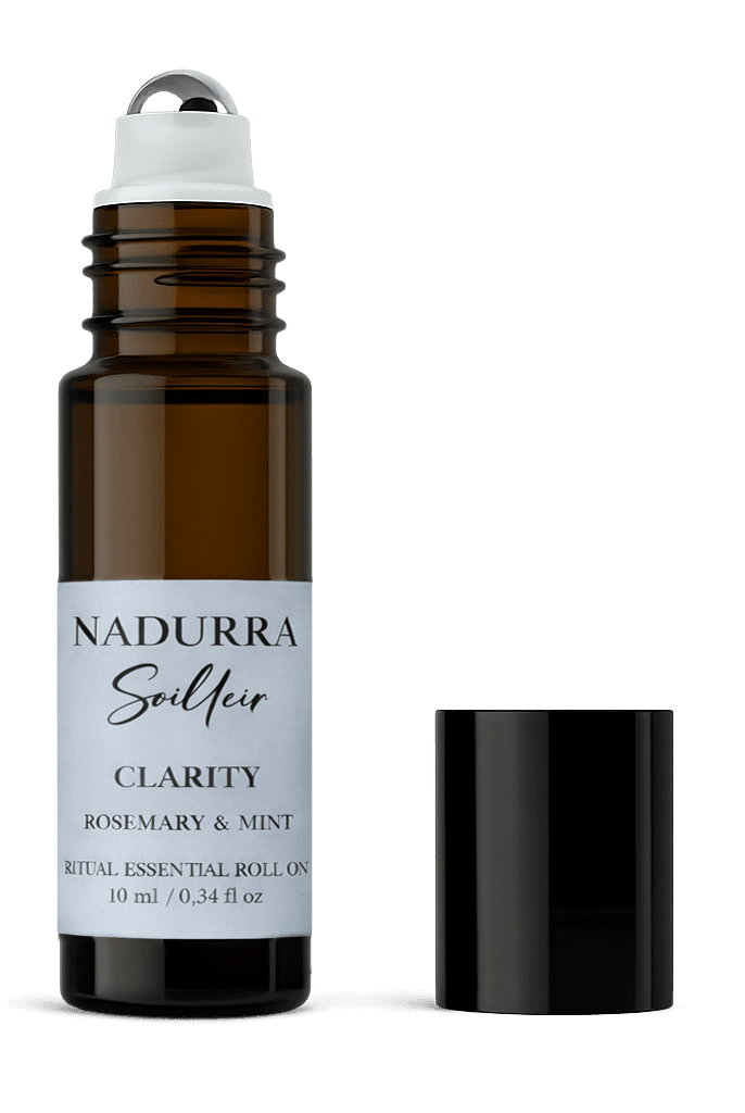 Nadurra Seilleir Clarity Rosemary & Minth essential oil roll-on bottle on a black background