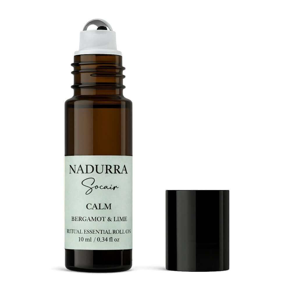 Roll-on bottle of Nadurra Socaer Calm Bergamot & Lime essential oil on a white background