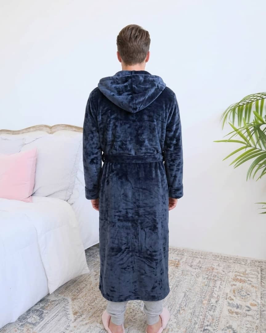Long Navy Hooded Fleece Robe on male model in bedroom setting back view - Cloud Nine Pajamas