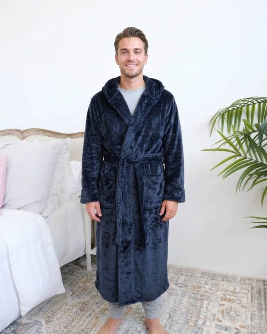 Long Navy Hooded Fleece Robe on male model in bedroom setting front view - Cloud Nine Pajamas