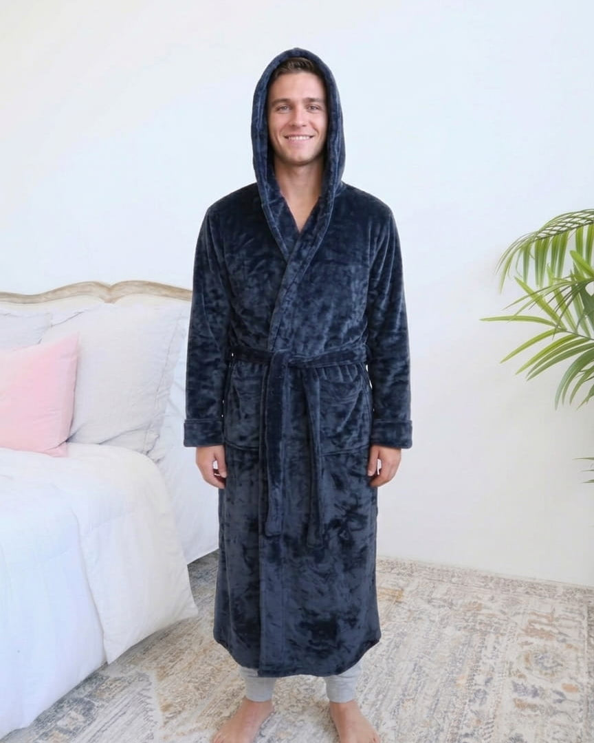 Long Navy Hooded Fleece Robe on male model in bedroom setting front view with hood up - Cloud Nine Pajamas