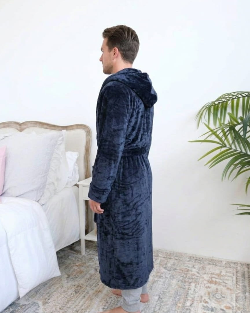 Long Navy Hooded Fleece Robe on male model in bedroom setting side view - Cloud Nine Pajamas