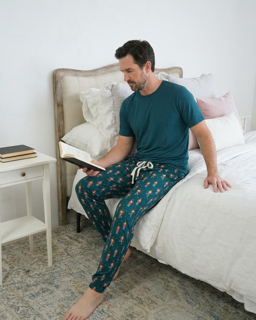 Bob's Sleepwear Co. Nutcracker Teal Bamboo Jogger Pant lifestyle on model — Cloud Nine Pajamas Edmonton