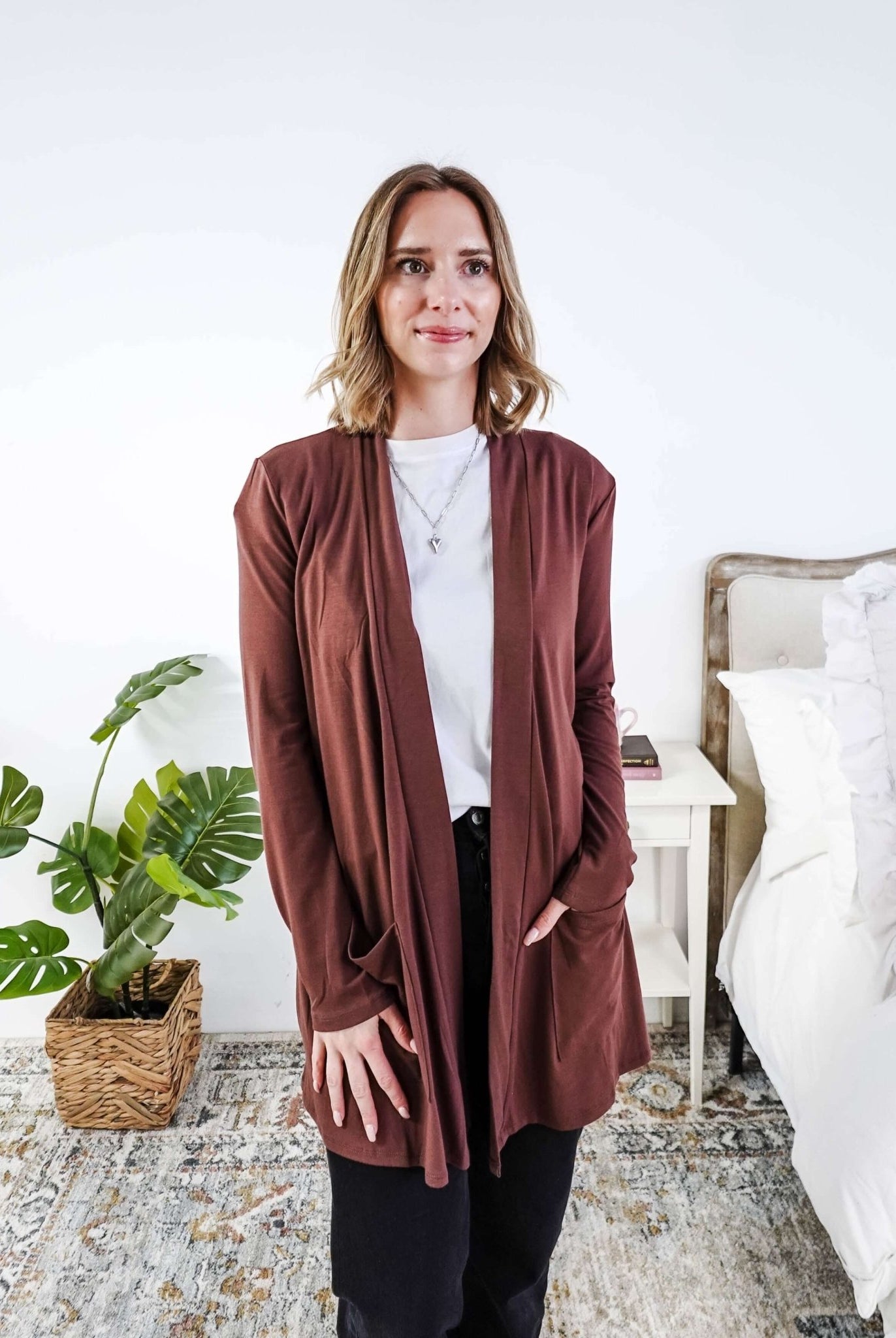 Woman wearing a brown cardigan in a bedroom setting Scarlett Ellie Summer Open Lightweight Cardigan | Cloud Nine Pajamas