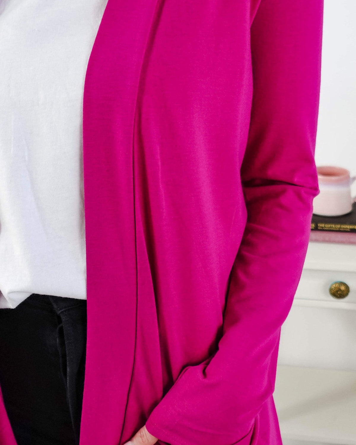 Close-up of a bright pink cardigan with a blurred background Scarlett Ellie Summer Open Lightweight Cardigan | Cloud Nine Pajamas