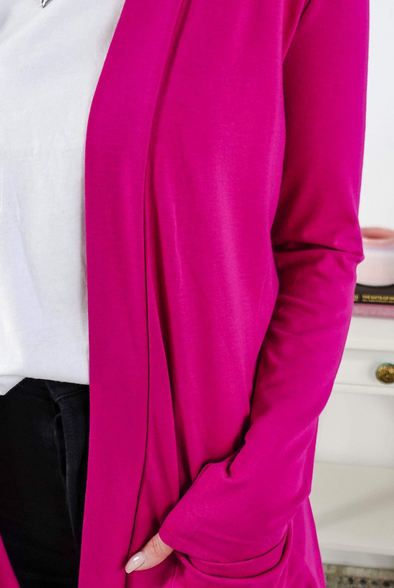 Close-up of a bright pink cardigan with a blurred background Scarlett Ellie Summer Open Lightweight Cardigan | Cloud Nine Pajamas