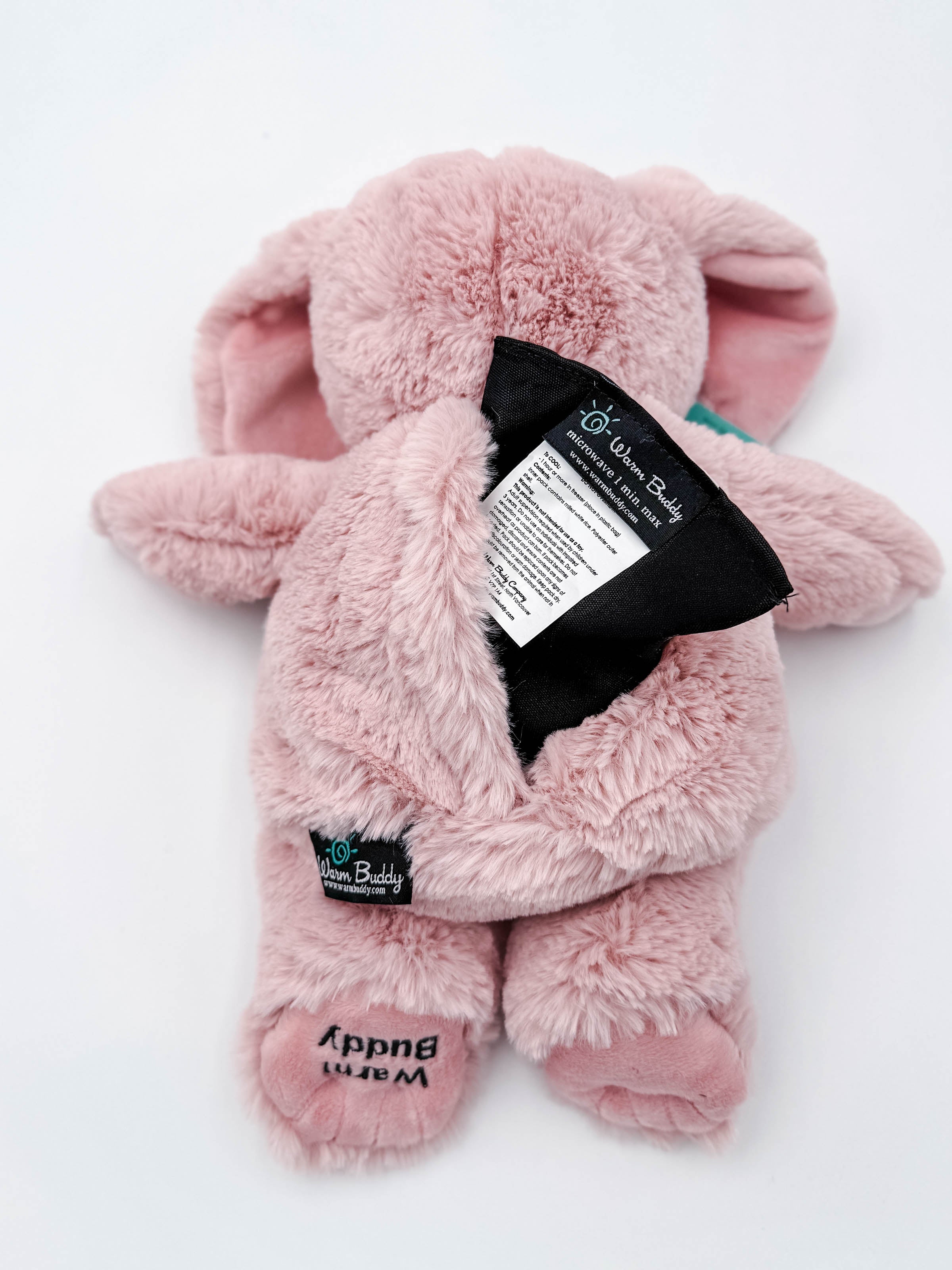 Cuddle Buddy Pink Bunny pink plush bunny from warm buddy with heating pack for moist therapy - showing microwaveable pack and opening