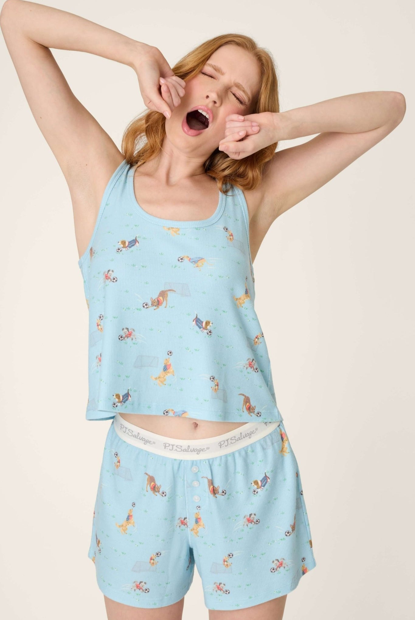 PJ Salvage - Boyfriend Peachy Waffle Tank & Boxer Set showcasing a model yawning in a playful sleepwear outfit.