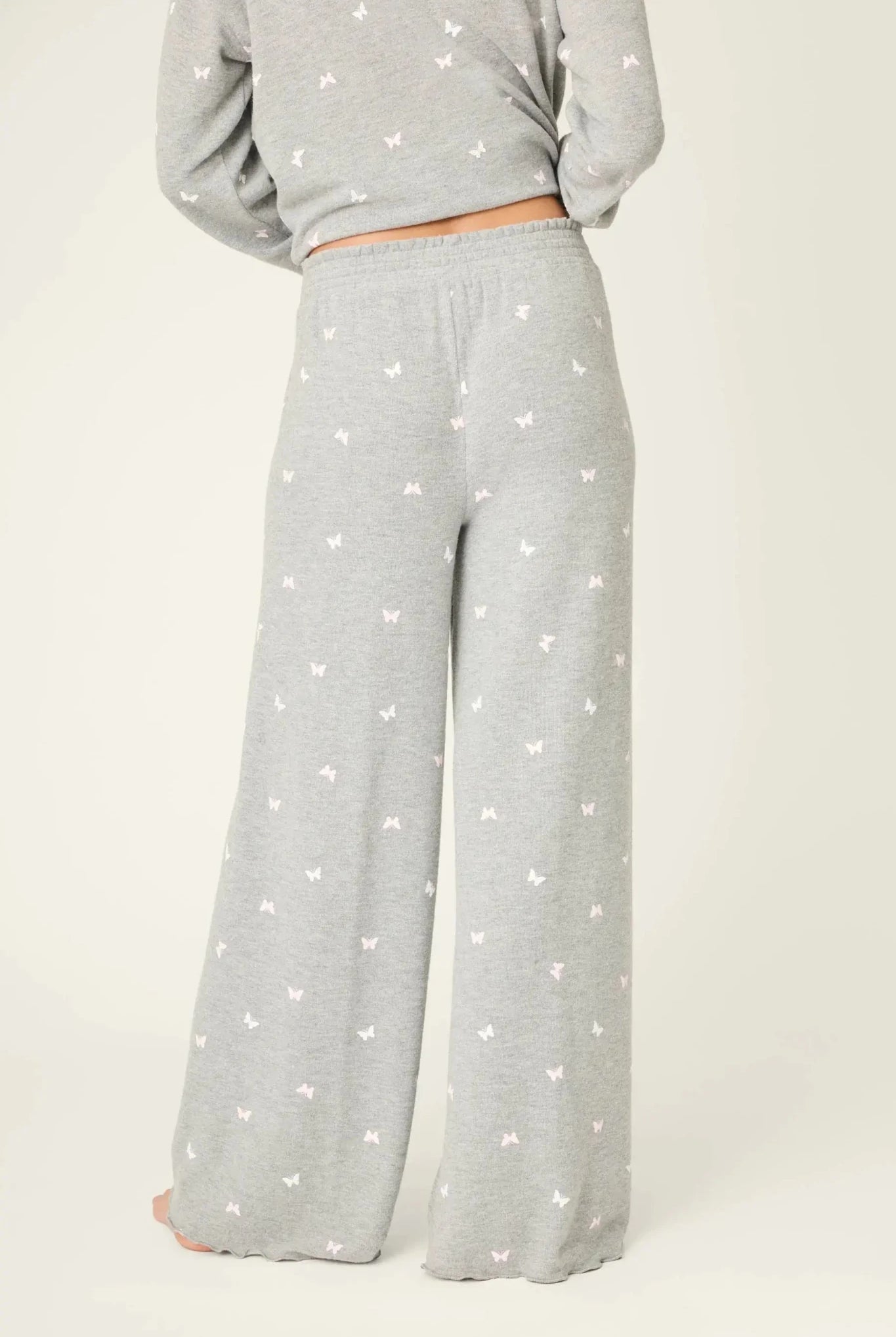 PJ Salvage Peachy Butterfly Kisses Lounge Set featuring soft grey fabric with pink butterfly prints and relaxed wide-leg pants. Back View of Pant