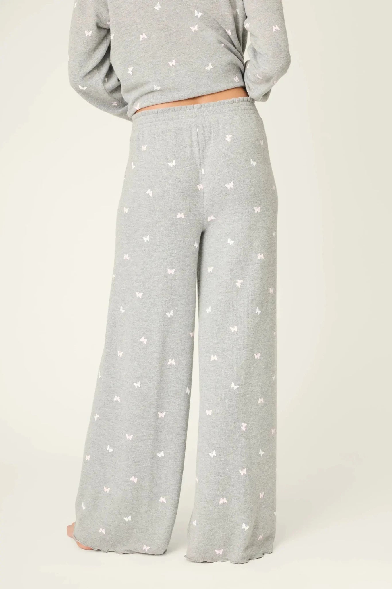 PJ Salvage Peachy Butterfly Kisses Lounge Set featuring soft grey fabric with pink butterfly prints and relaxed wide-leg pants. Back View of Pant