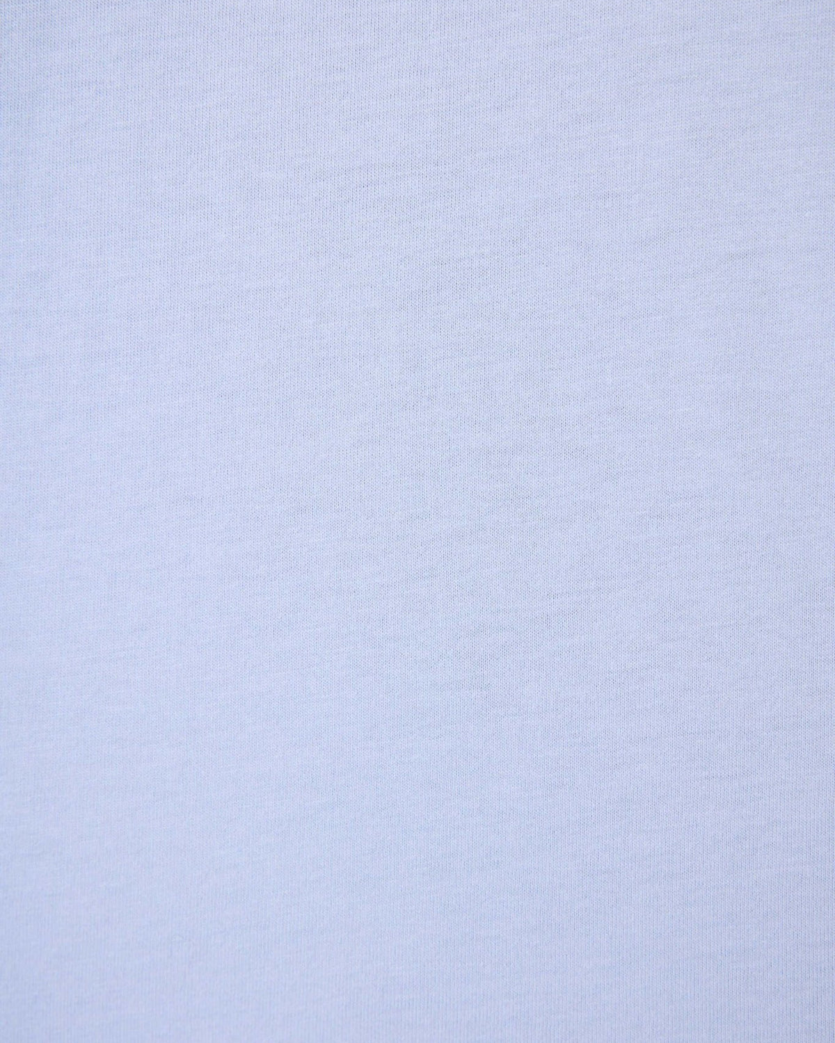 PJ SALVAGE Graphic Print Softee Tee & Short Lounge Set in "Nap Time is my Happy Hour" graphic tee shirt in light blue. Close up of the Fabric showing texture and colour of the softee set