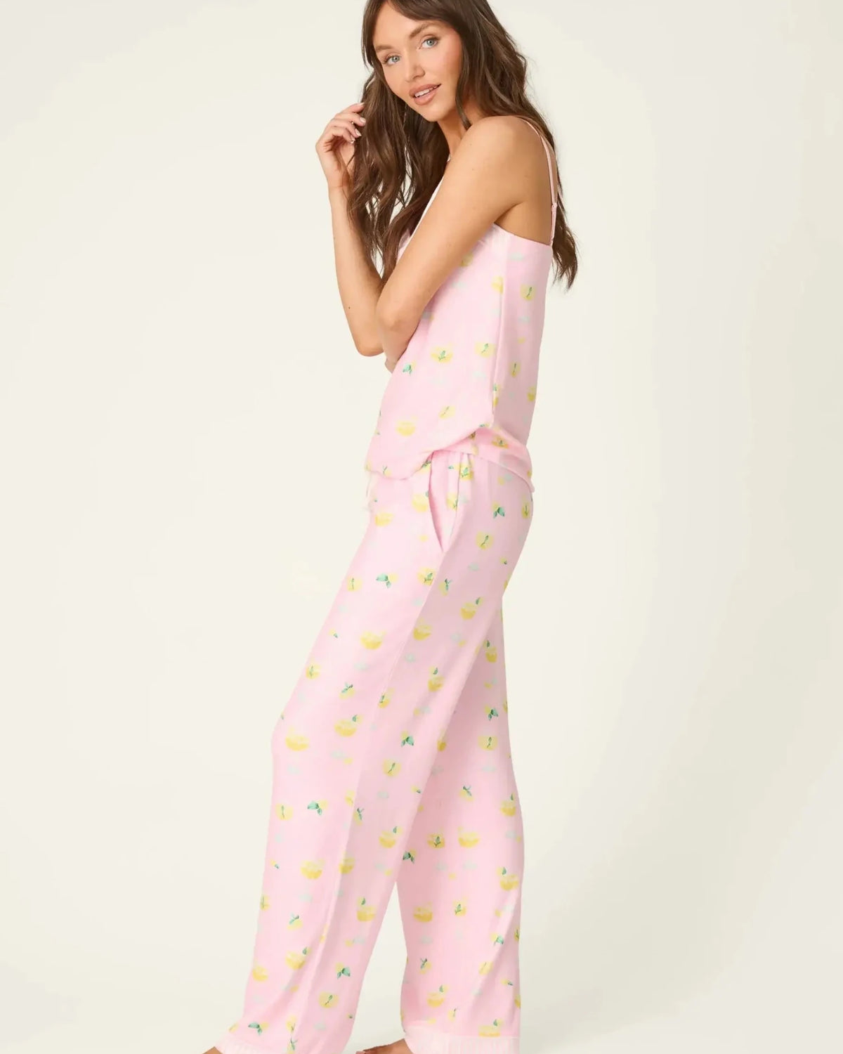 PJ Salvage - La Dolce Spritz Limoncello Life Long Butter Jersey PJ Set in pink with lemon print modeled side view.