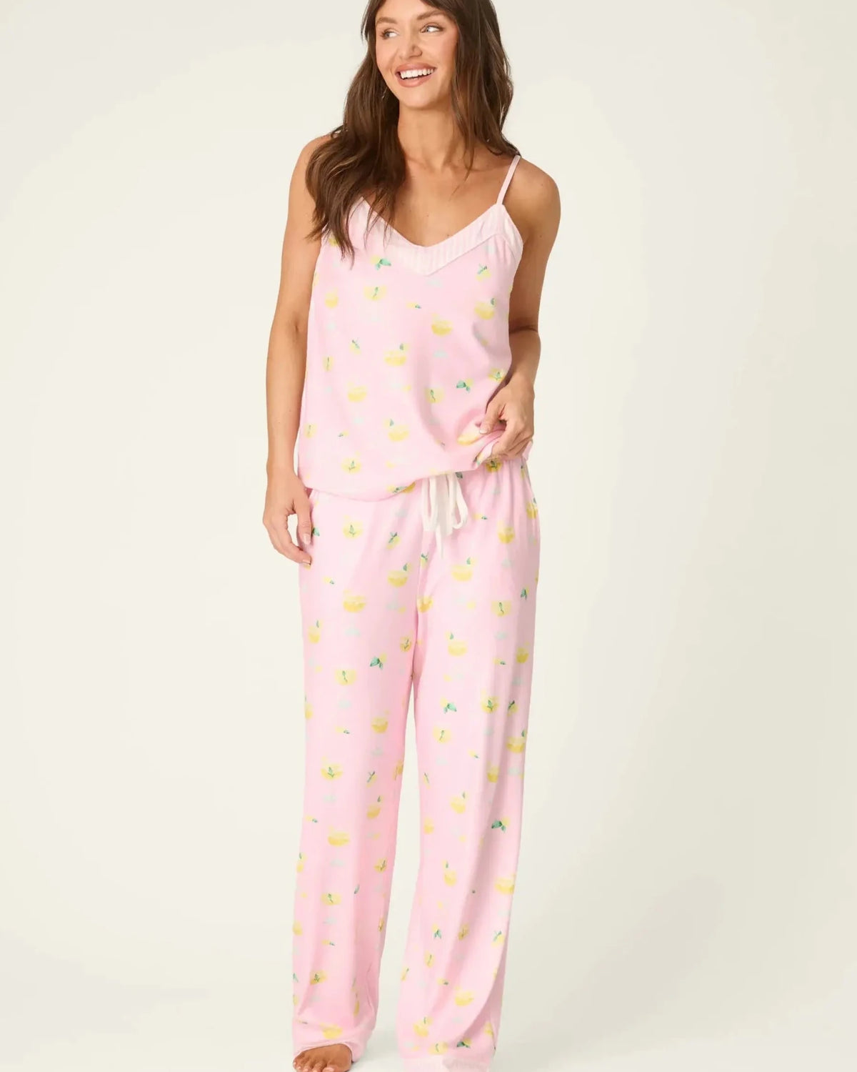 PJ Salvage - La Dolce Spritz Limoncello Life Long Butter Jersey PJ Set model wearing pink pajama set with lemon print.