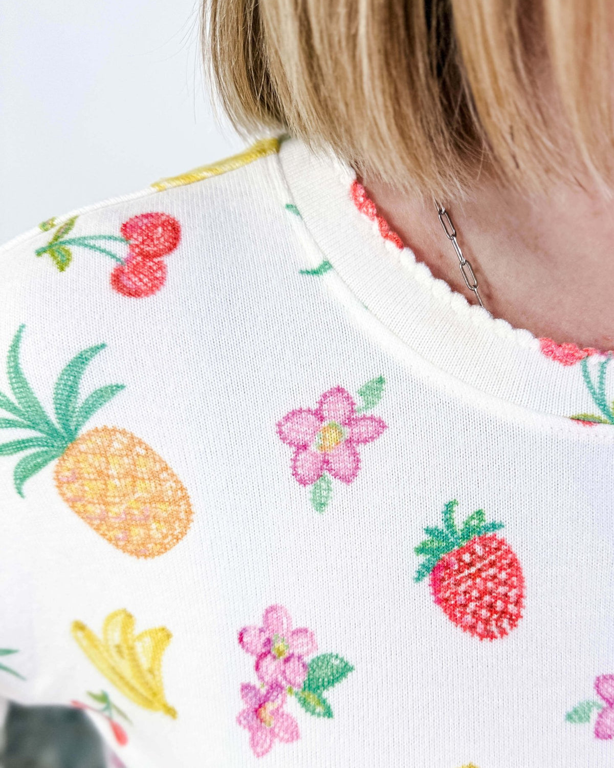 PJ SALVAGE — Viva la Vida Fruit Fiesta Long Sleeve & Pant Set worn on model in a bedroom setting, close up of scalloped detail on collar of the top