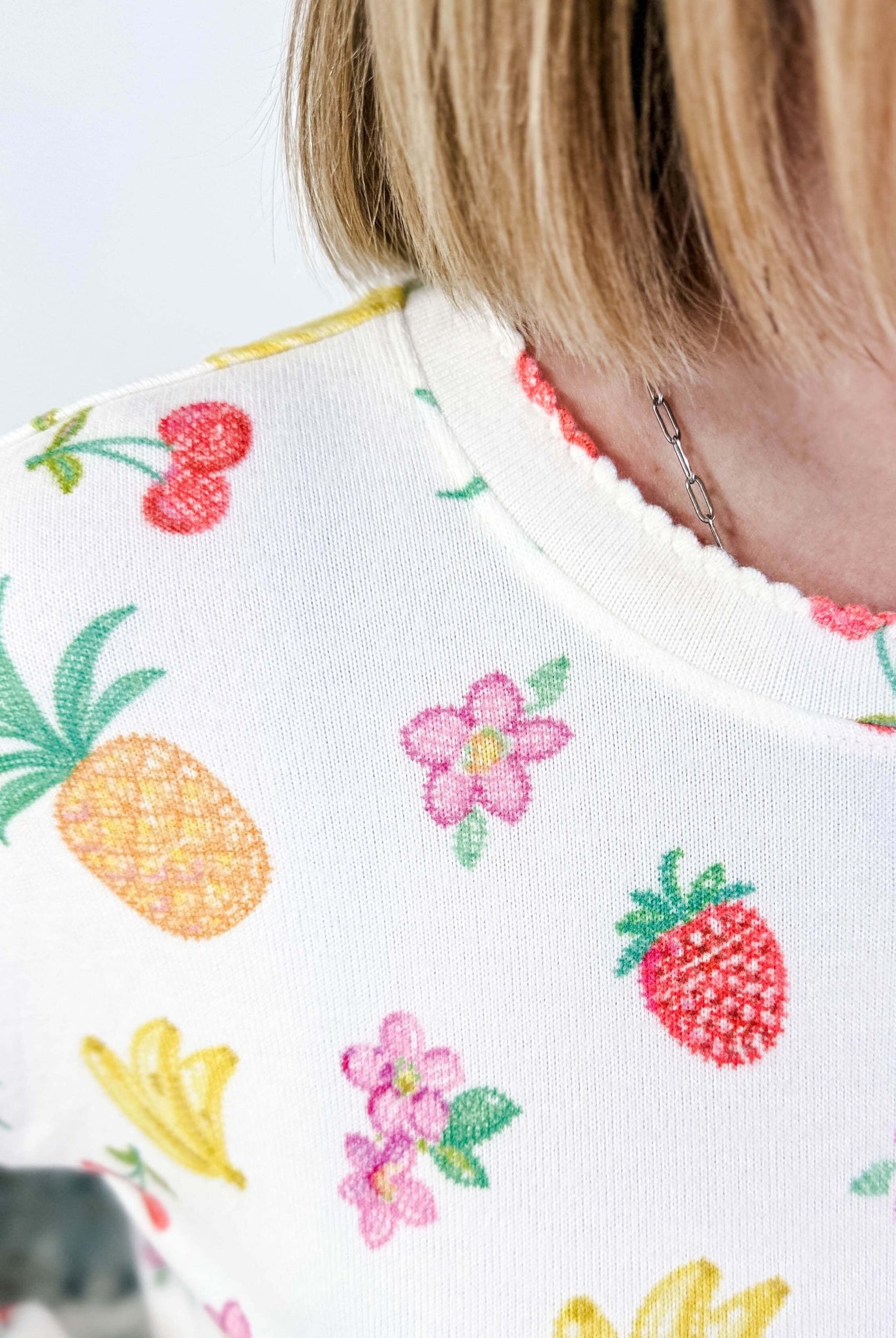 PJ SALVAGE — Viva la Vida Fruit Fiesta Long Sleeve & Pant Set worn on model in a bedroom setting, close up of scalloped detail on collar of the top
