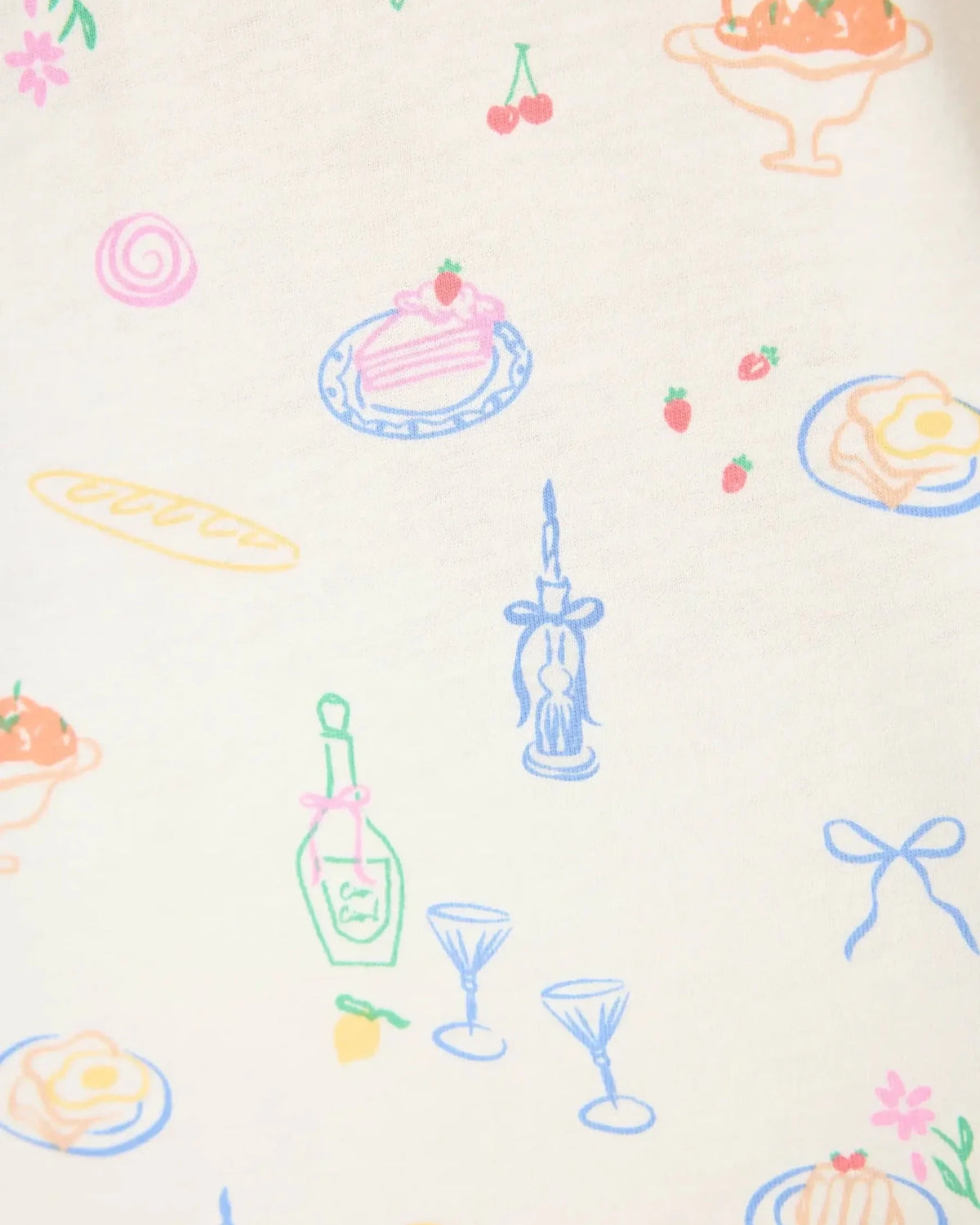 Colorful food and drink illustrations on the fabric of the PJ Salvage Whimsy Button Up & Short Short Set.